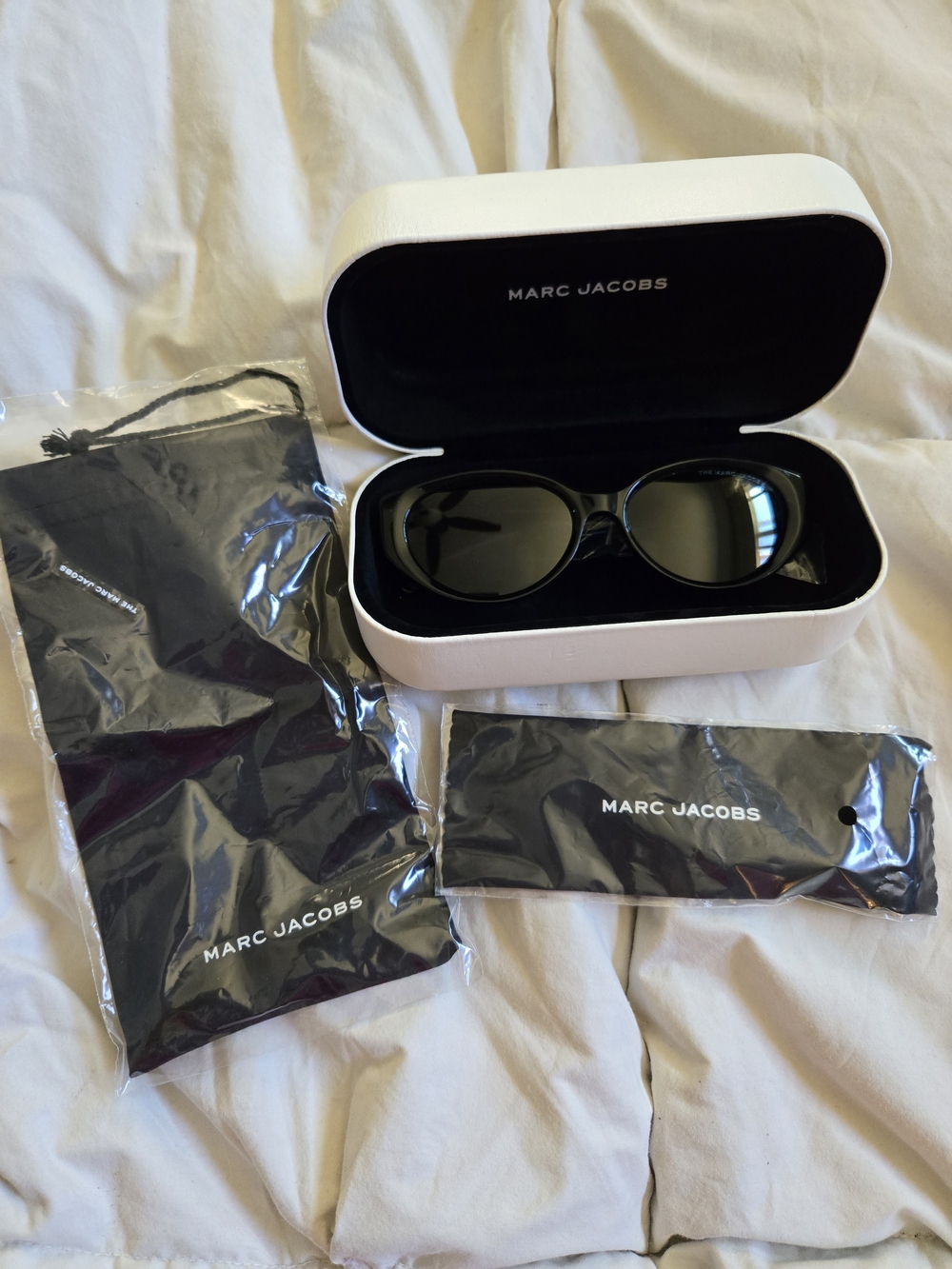Marc Jacobs Black Oval Sunglasses with White Case
